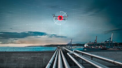 A harbor over which a drone is flying.