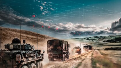 A military convoy scanning the sky for drones